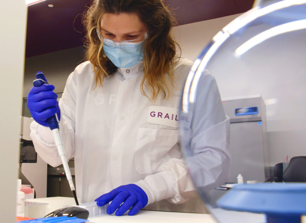 Grail technician working in lab